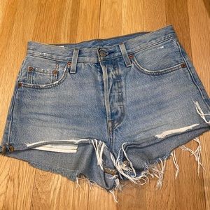 Levi 501 jean shorts. Size 25. Slightly worn.